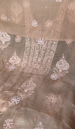 The peach kurta, spread out flat