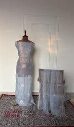 Powder blue organza silk set on the mannequin with its dupatta