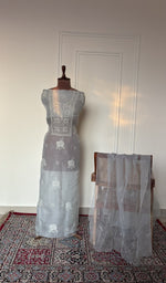 Powder blue organza silk set on the mannequin with its dupatta