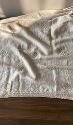 Hand embroidery on white eri silk