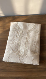 Folded white eri silk kurta fabric, second view