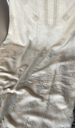 White eri silk laid out flat