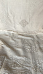 Close view of the white kurta fabric
