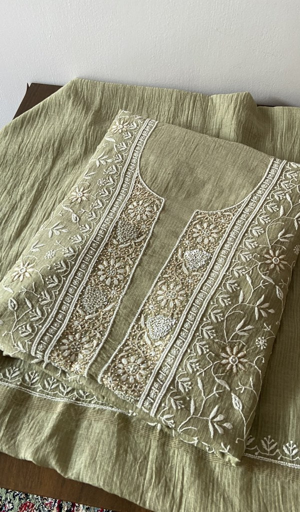 Olive pure mul chanderi kurta piece folded, beads badla work mukaish work and multicoloured cutdana in view