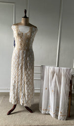 The set on the mannequin with its dupatta beside it
