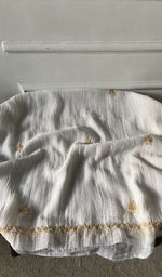 Bottom fabric draped over the stool