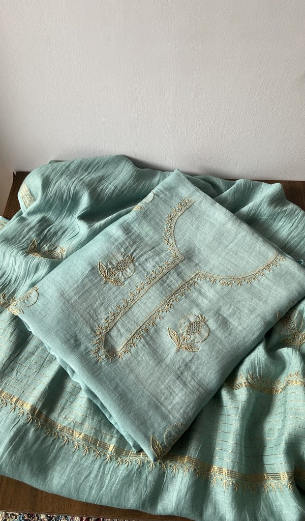 Blue pure mul chanderi kurta piece folded, fine do taar and teen taar chikankari with anar motifs