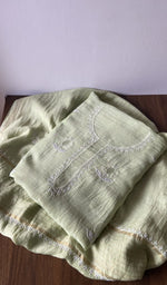 Green pure mul chanderi kurta piece folded, fine do taar and teen taar chikankari with anar motifs