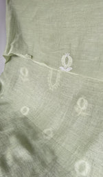 The kurta piece folded on the carpet