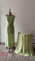The set on the mannequin with its dupatta beside it