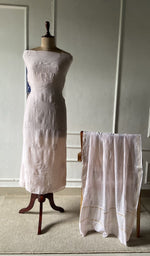 The set on the mannequin with its dupatta beside it