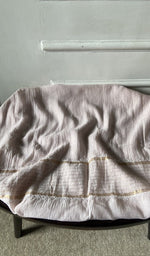 Bottom fabric draped over the stool