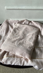 The folded set, kurta on top