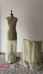 The set on the mannequin with its dupatta beside it