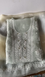 Blue pure organza silk kurta piece folded, do taar and teen taar chikankari with zari haath ki jaali
