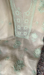 Motifs across the body of the yellow kurta
