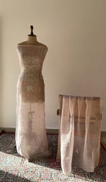 The set on the mannequin with its dupatta beside it