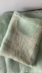Green pure organza silk kurta piece folded, do taar and teen taar chikankari with zari haath ki jaali