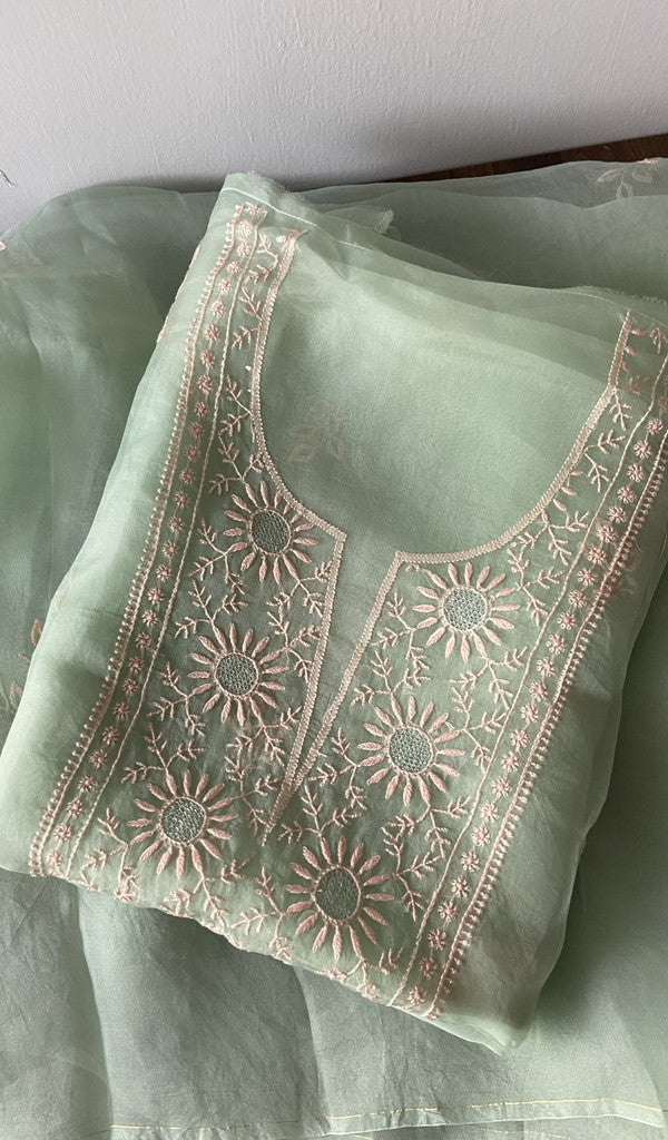 Green pure organza silk kurta piece folded, do taar and teen taar chikankari with zari haath ki jaali