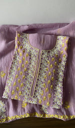 Folded kurta piece and dupatta, chikankari along the hem