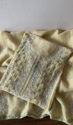 Folded kurta piece and dupatta, chikankari in silver thread along the hem