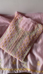 Folded kurta piece and dupatta, chikankari in gold thread along the hem