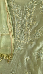 Pista green mul chanderi laid flat on the table