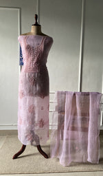 The set on the mannequin with its dupatta beside it