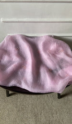 Bottom fabric draped over the stool