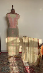 The set on the mannequin with its dupatta beside it
