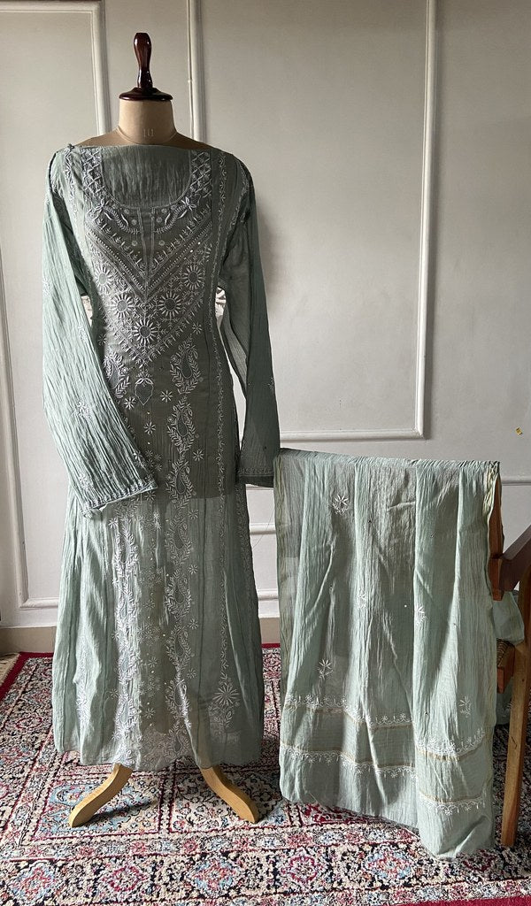 Sage green pure mul chanderi chikankari 3 pc semi-stitched suit set laid out