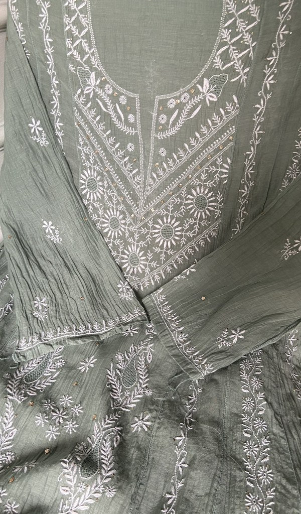 Border and hem of the sage green pure mul chanderi