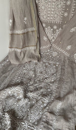 Fine front and back chikankari anarkali with haath ki jaali across the body of the kurta piece