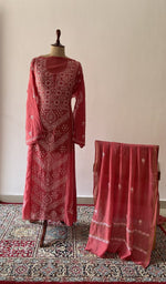 Red pure mul chanderi chikankari suit set on the mannequin with its dupatta