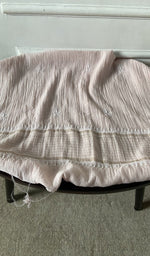 Bottom fabric draped over the stool