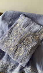 Folded kurta piece and dupatta, chikankari along the hem