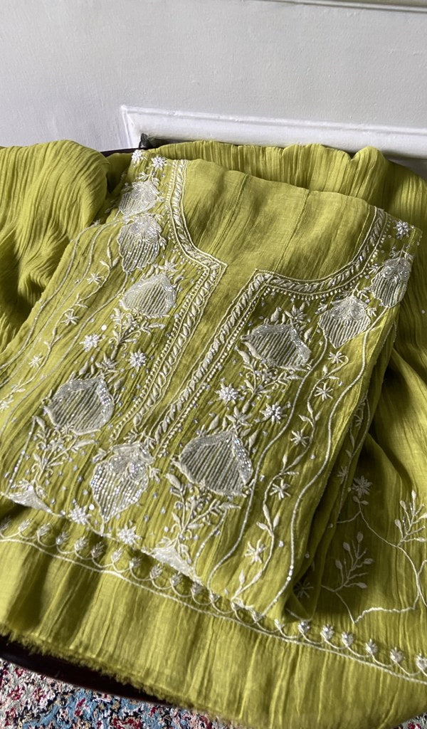 Olive pure mul chanderi kurta piece folded, front back chikankari anarkali in view