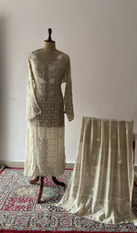 Beige pure mul chanderi chikankari suit set on the mannequin with its dupatta