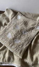 Folded kurta piece and dupatta, chikankari along the hem