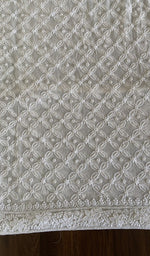 The white kurta, spread out flat