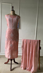 The set on the mannequin with its dupatta beside it