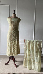 The set on the mannequin with its dupatta beside it
