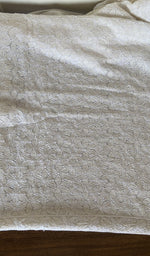 Close view of the white kurta fabric
