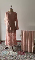 The set on the mannequin with its dupatta beside it