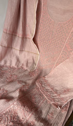Motifs across the body of the peach kurta