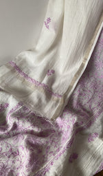 The kurta piece folded on the carpet