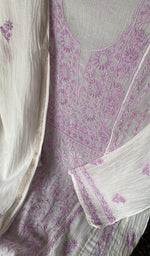 Fine front and back chikankari anarkali with haath ki jaali across the body of the kurta piece
