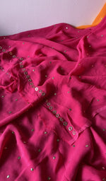 The folded set, kurta on top