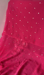 The kurta piece folded on the carpet