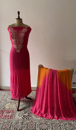 The set on the mannequin with its dupatta beside it